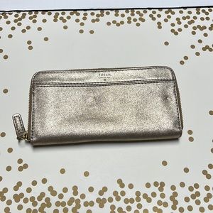 Gold and gray Fossil wallet